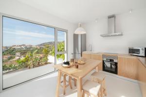 Casas da Vargem shared swimming pool by An Island Apart