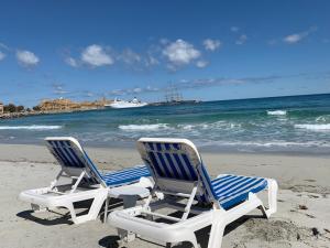 Appartements L’Ile Rousse les pieds dans l’eau : photos des chambres