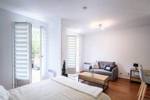 Appartements TOP Cosy studio avec Terrasse a 10min Disney-Shopping Vallee : photos des chambres