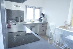 Appartements Studio Cosy Saint-Quentin : photos des chambres