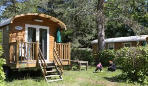 Campings Camping le Nid du Parc : Roulotte  - Non remboursable