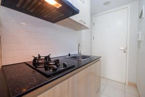 Deluxe Studio Apartment at Springlake Summarecon Bekasi By Travelio