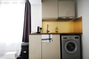 Appartements Studio de charme, 30' Paris, 5' Evry, 10' Orly : photos des chambres