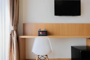 Twin Bed Studio Room at Annora Living Apartment By Travelio