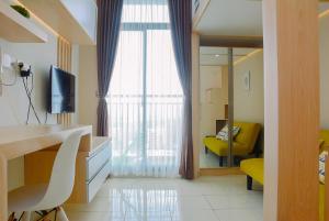 Stylish and Convinient Studio Dave Apartment By Travelio