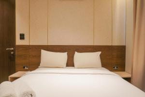 Elegant 2BR Citralake Suites Apartment By Travelio