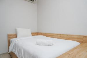 Elegant 2BR Citralake Suites Apartment By Travelio