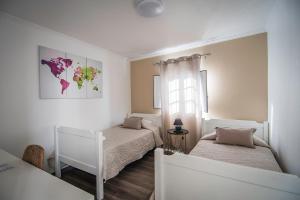 Twin Room with Private Bathroom room in Casa de Hospedes Isaias