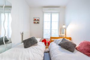Appartements Family Travel Paris 3 : photos des chambres