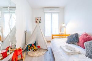 Appartements Family Travel Paris 3 : photos des chambres