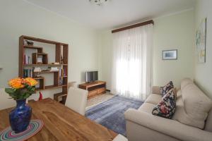 Casa Dany, luminoso trilocale con grande terrazza, box auto e AC