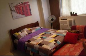 Favila Condotel unit in Palmtree Villas Newport City walking distance to Airport terminal 3 Accessable to Airport terminal 1 &2