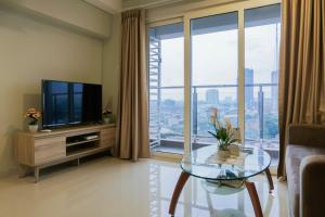 Modern 2BR Apartment at Maqna Residence By Travelio