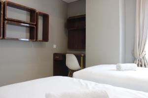 Deluxe 2BR at The Green Kosambi Bandung Apartment By Travelio