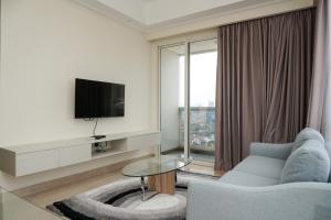 Best Price and Comfortable 2BR with Private Lift Apartment at Menteng Park By Travelio