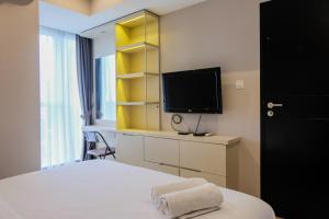 Fully Furnished 1BR at Branz BSD City Apartment By Travelio