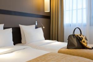 Hotels Simon's Boutique Hotel : photos des chambres