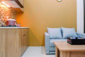 Connected to Mall 2BR Apartment at Green Pramuka City By Travelio
