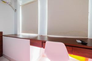 Town View 1BR at Patraland Urbano Apartment By Travelio