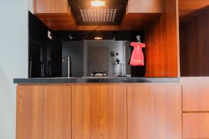 Town View 1BR at Patraland Urbano Apartment By Travelio