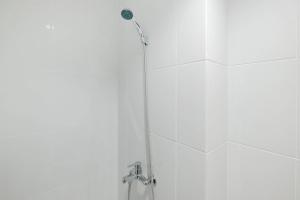 Town View 1BR at Patraland Urbano Apartment By Travelio