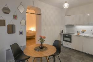 Appartements COSY APPARTEMENT EN PLEIN CENTRE-VILLE !!! : photos des chambres