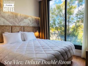 Deluxe Double Room with Side Sea View room in Marina Premium