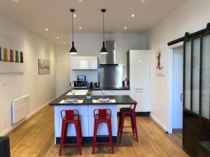 Appartements La Renaissance au coeur du centre historique : photos des chambres