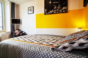 Appartements Appart'Hotel La Cite Des Affaires : photos des chambres