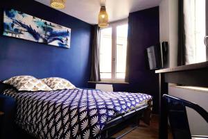 Appartements Appart'Hotel La Cite Des Affaires : photos des chambres