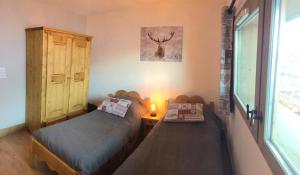 Appartements Les 7 laux immobilier chalet F : photos des chambres