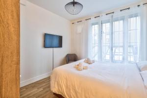 Appartements NEW Paradis - 2Bdrs Flat in the Heart of Paris : photos des chambres