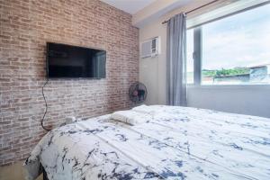 1BR Interiored Condo with WiFi, Netflix, Hot Shower - The Hive Residences
