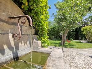 Hotels Hotel Sous les Figuiers : photos des chambres