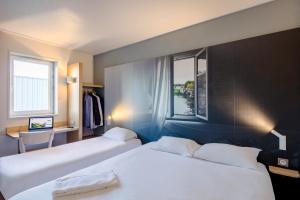 Hotels B&B HOTEL Poitiers 1 Futuroscope : photos des chambres