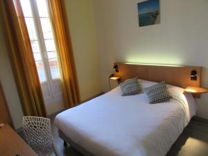 Hotels Contact Hotel de France : photos des chambres