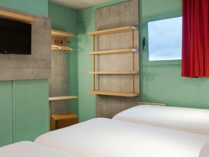 Hotels ibis budget Chilly-Mazarin Les Champarts : photos des chambres