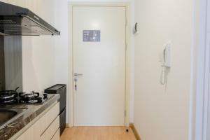 Fully Parquette City View Studio Apartment at M-Town Residence By Travelio