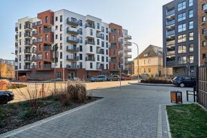 Apartments Dmowskiego Kępa Mieszczańska by Renters