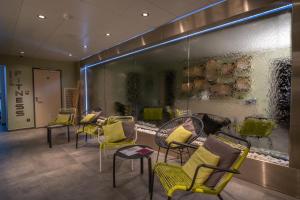 Hotels Kyriad Prestige Lyon Est - Saint Priest Eurexpo Hotel and SPA : photos des chambres