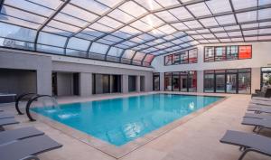 Hotels Kyriad Prestige Lyon Est - Saint Priest Eurexpo Hotel and SPA : photos des chambres