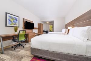 Standard Queen Room with Two Queen Beds and Mobility Accessible Tub room in Holiday Inn Express & Suites - St. Petersburg - Madeira Beach an IHG Hotel