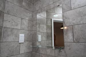 Standard Single Room with Shared Bathroom room in OYO Greenleafe Hotel