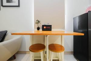 Newly Furnished 2BR Apartment at Springlake Summarecon By Travelio