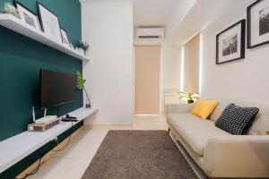 Newly Furnished 2BR Apartment at Springlake Summarecon By Travelio