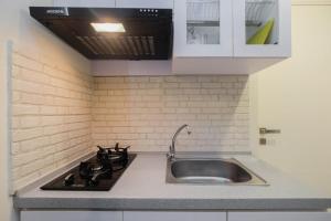 Newly Furnished 2BR Apartment at Springlake Summarecon By Travelio