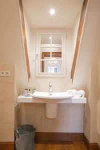 Appartements La Tonnellerie : photos des chambres