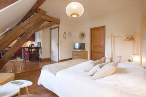 Appartements La Tonnellerie : photos des chambres