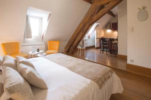 Appartements La Tonnellerie : photos des chambres