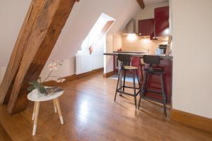 Appartements La Tonnellerie : photos des chambres